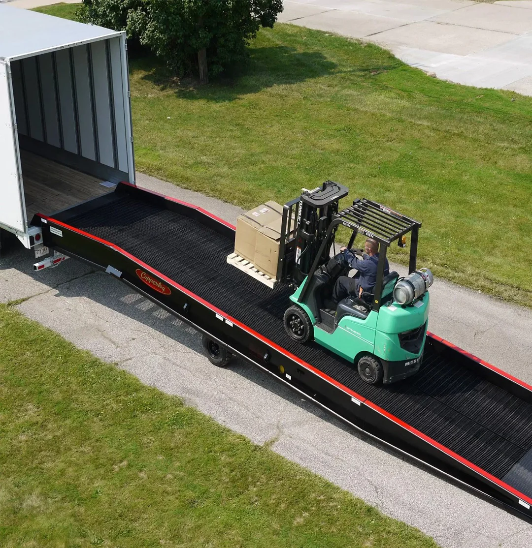 Mobile Ramps provide fast, safe loading and unloading solutions, enabling smooth forklift movement between trucks and warehouses efficiently.